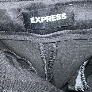 Black trouser, belt loops and pockets, zip